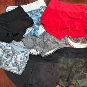 SOLD; lot of eleven Lululemon speedup shorts; mid or high rise;